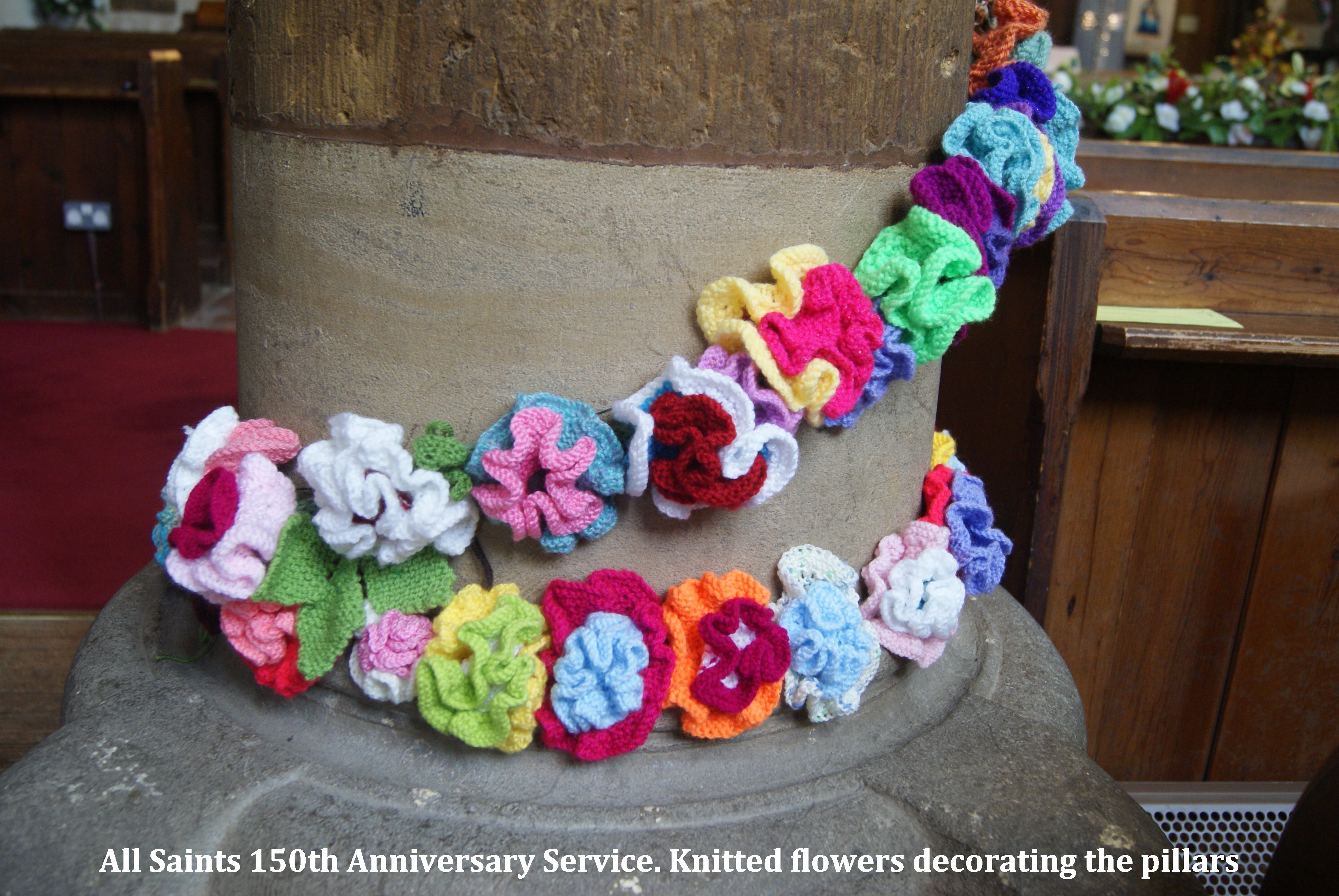(002) Knitted flowers decorating the pillars